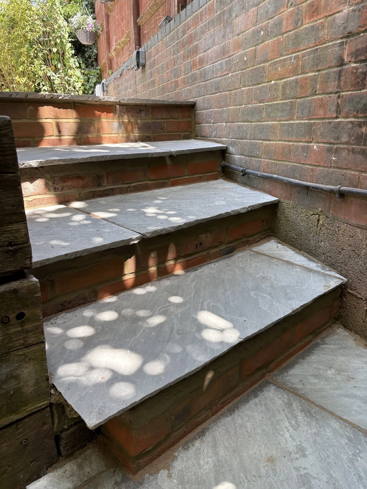 Raised patio with glass balustrade